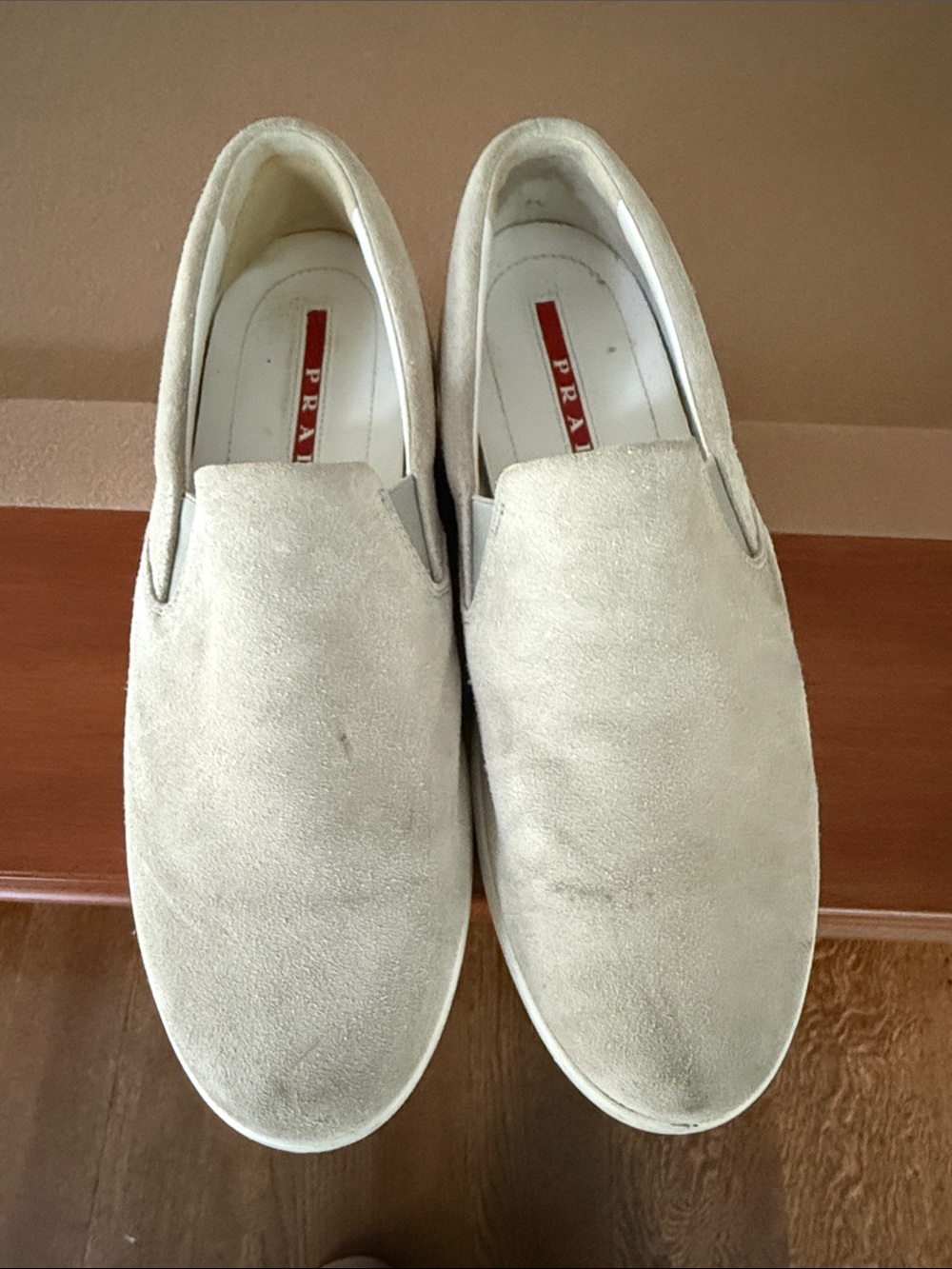 Prada women’s  Suede Slip-On sneaker in Light Beige
